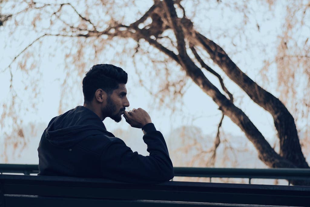 Man in deep thought calmly deciding between ideas